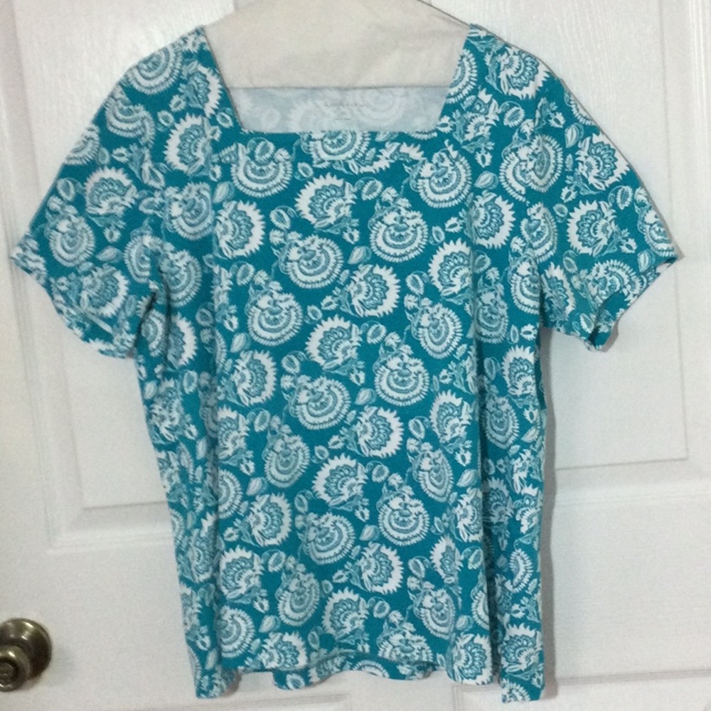 Kim Rogers teal colored t-shirt/ blouse